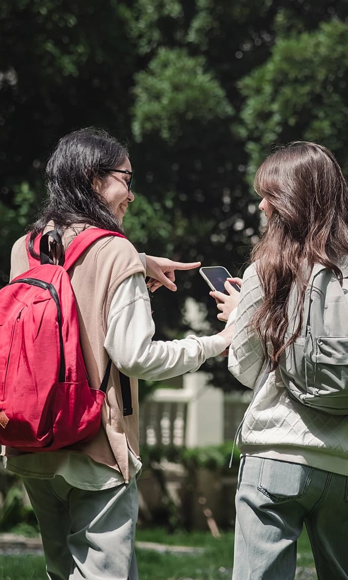 Two students talking together on campus