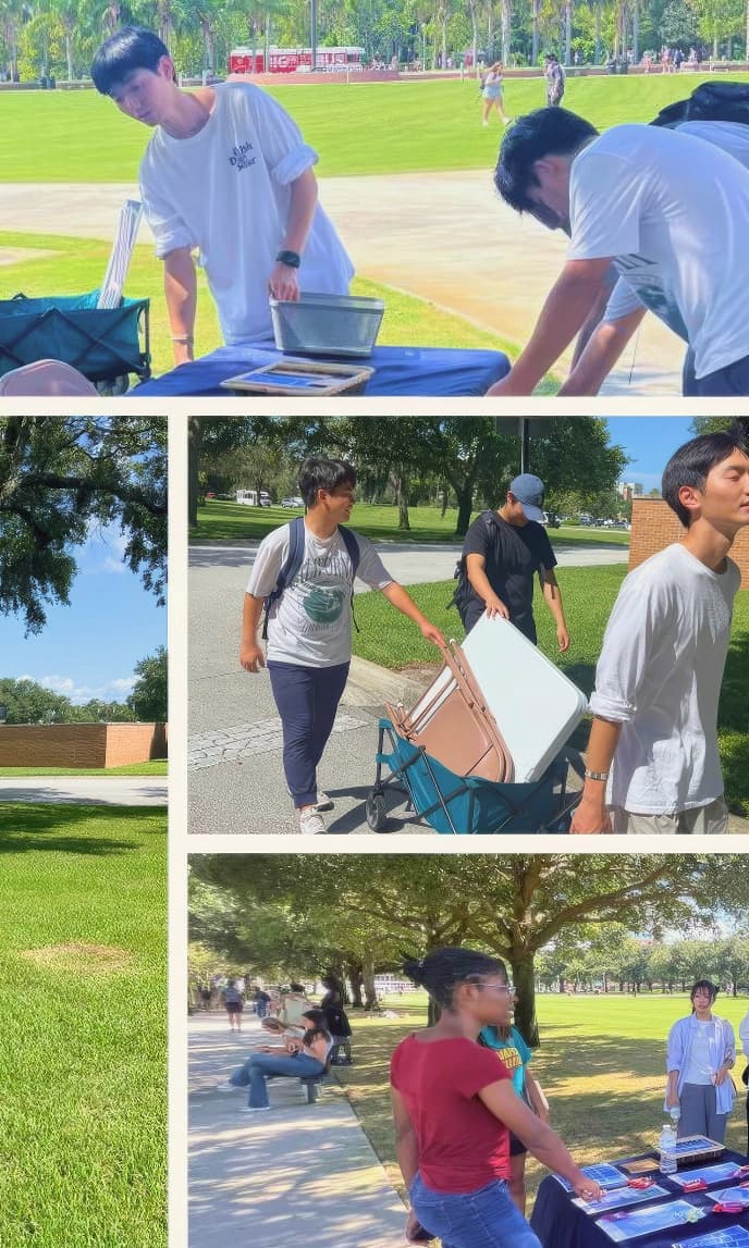 YEF students setting up an outreach table on campus