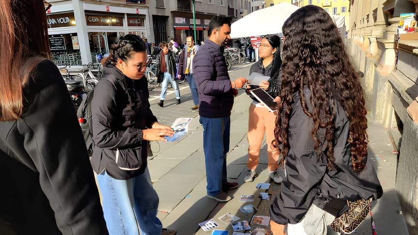 YEF members handing out tracts on a European street