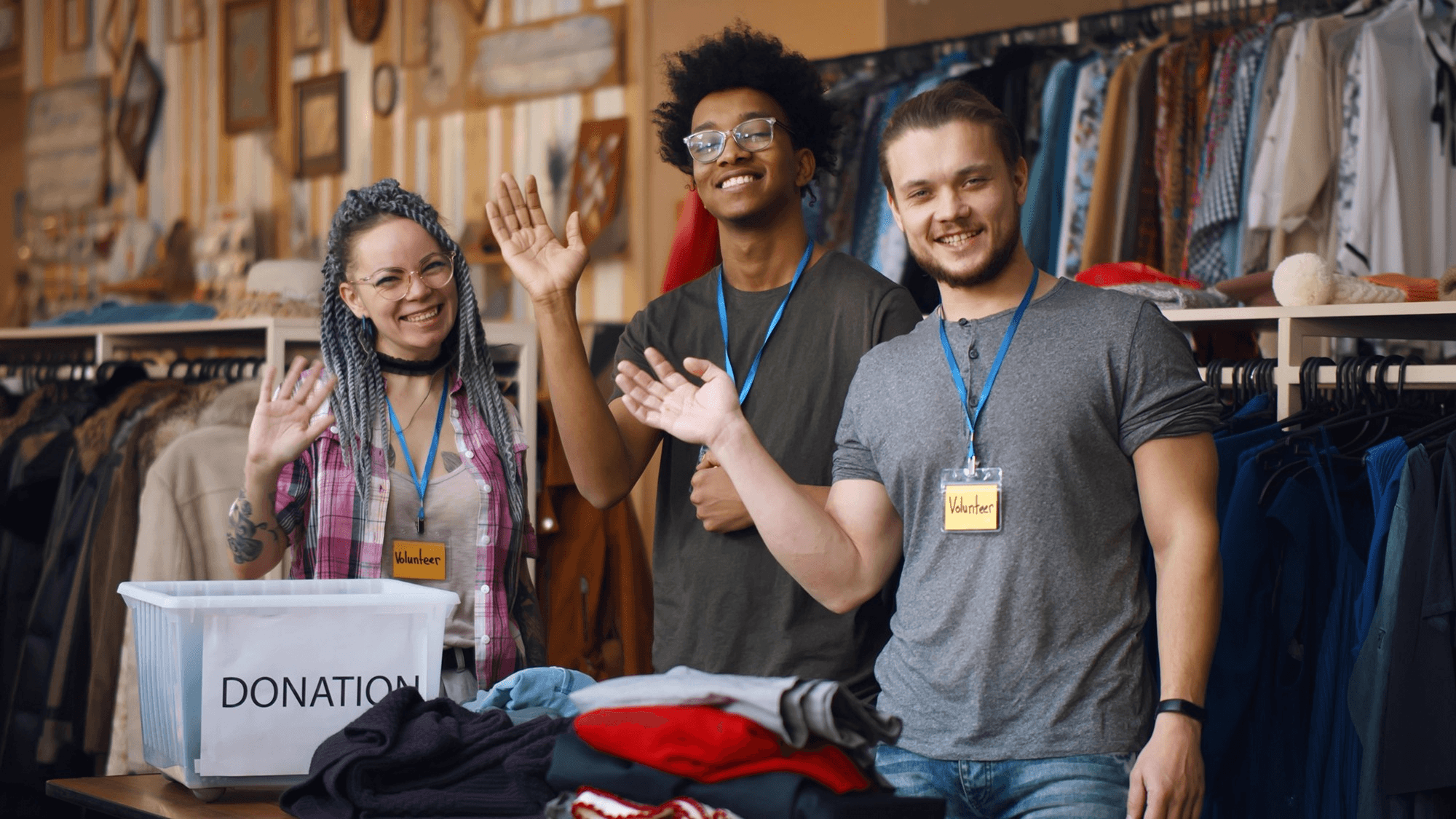Volunteers sorting clothing at a donation drive