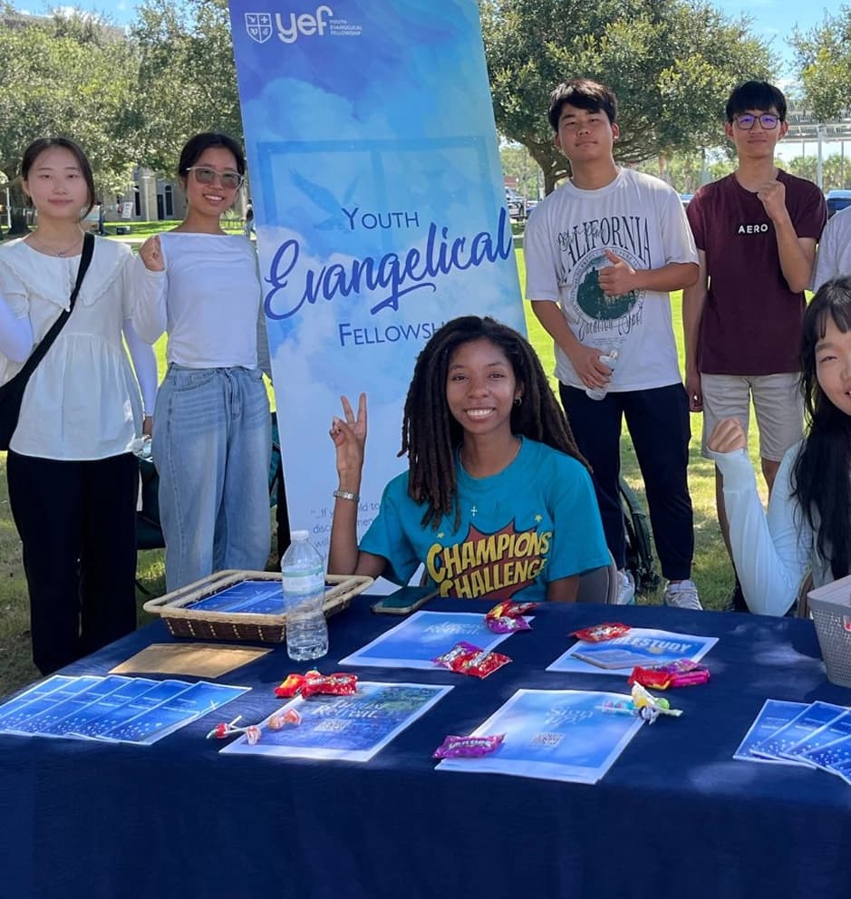 Students at a YEF welcome table on campus in St. Louis